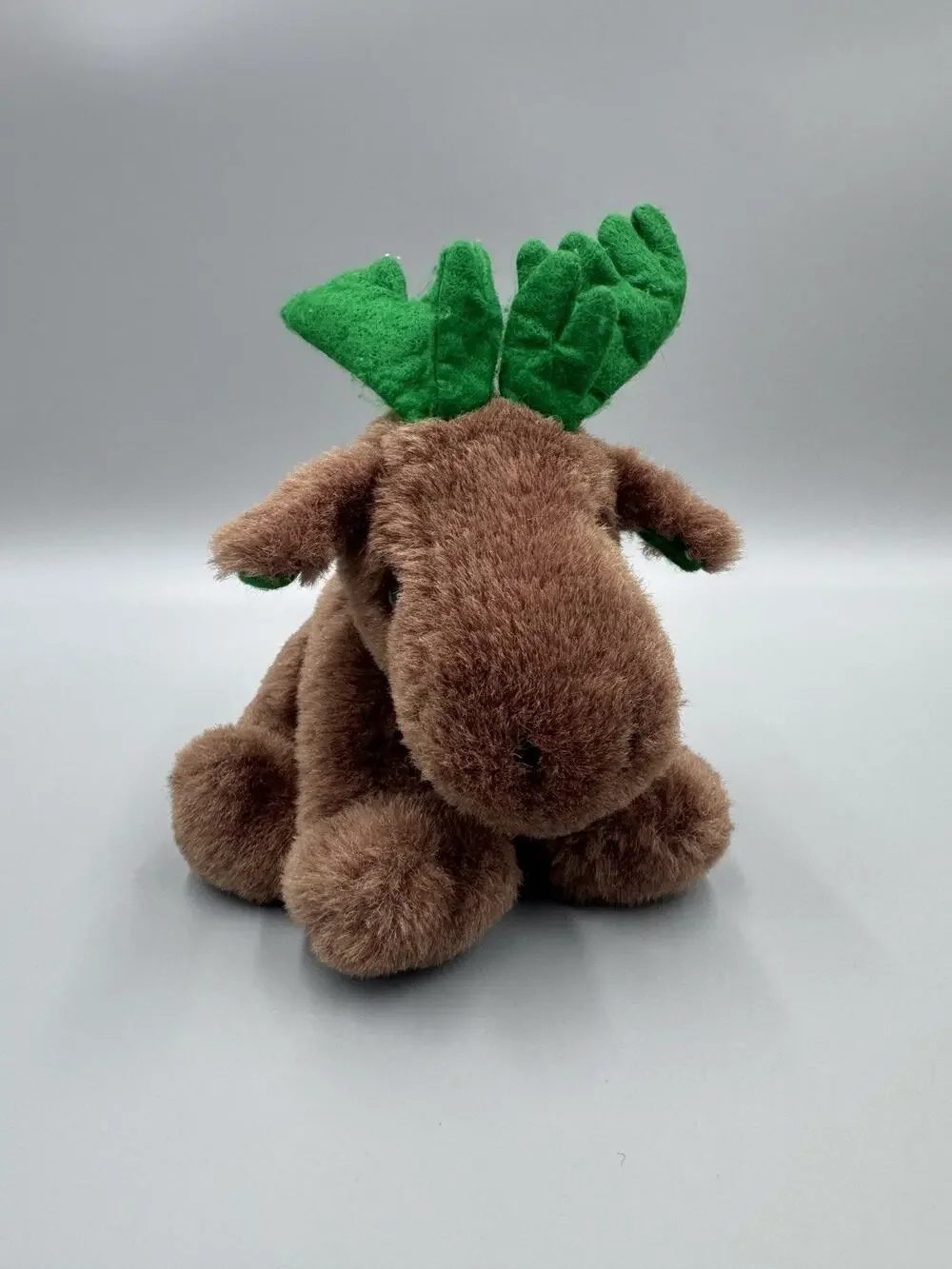 US Tops Merchandising Corp Brown Moose Reindeer Plush W/ Green Antlers 6”